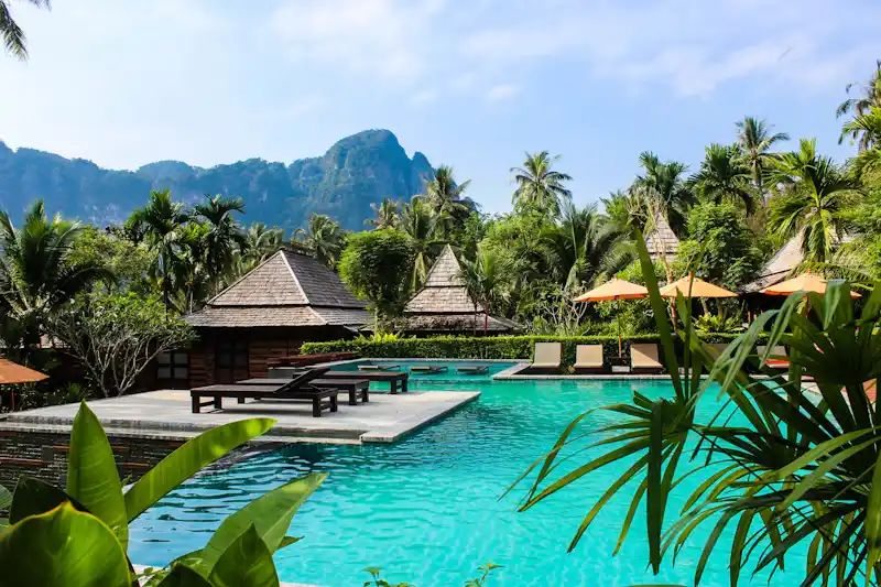Resort pool with palm trees